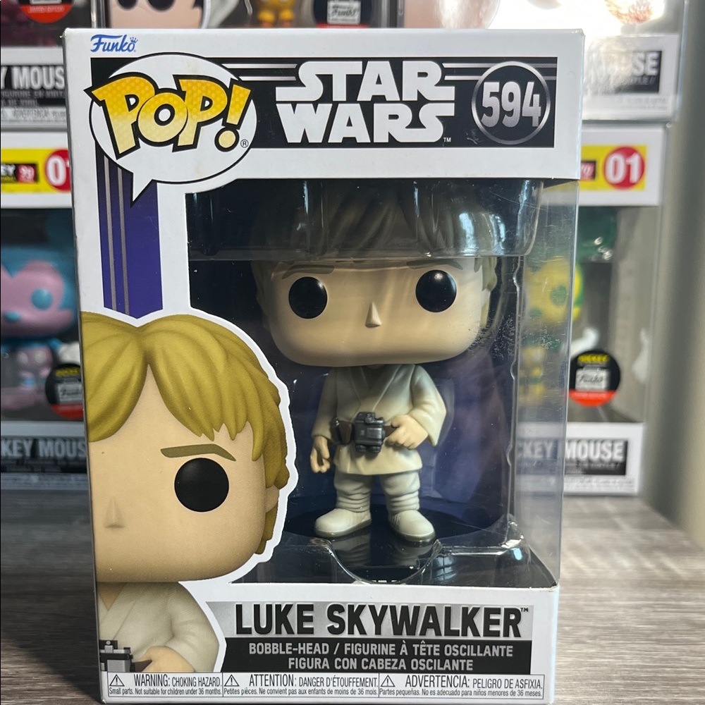 Funko Pop Star Wars Luke Skywalker Figure - White and Black